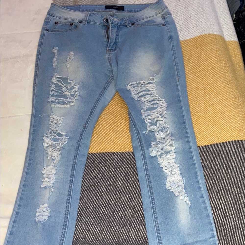 Distressed light wash jeans